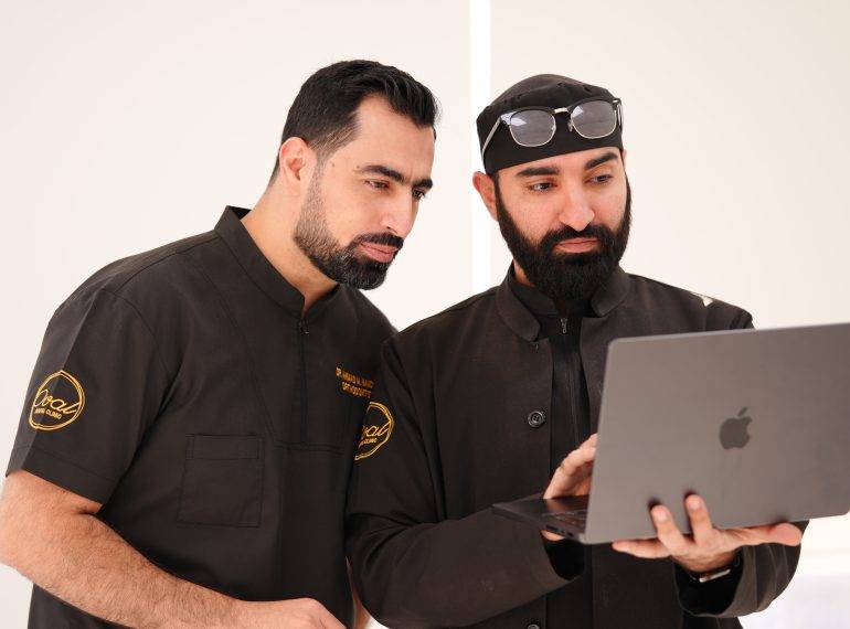 Two Dentist Checking Dental Lab